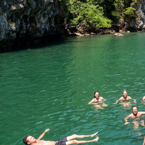 Private Angthong Marine Park Sailing Charter – guests swimming in the Emerald Lake on Koh Mae Koh – TourInKohSamui.com