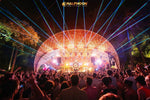 Halfmoon Harmony Beach Party Koh Phangan – orange-lit dome stage with laser beams at night