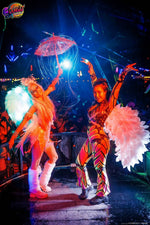 Jungle Experience Party Koh Phangan – two performers in white feathered costumes on stage