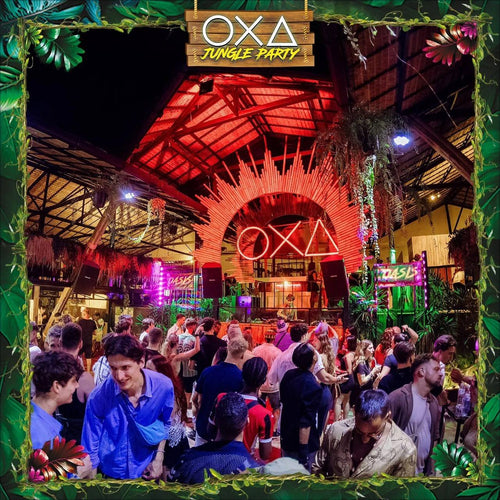 OXA Jungle Party Koh Phangan – partygoers under the red-lit main stage roof