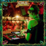 OXA Jungle Party Koh Phangan – DJ with headphones mixing at the decks