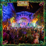 OXA Jungle Party Koh Phangan – main stage lit in purple and blue with the crowd in front