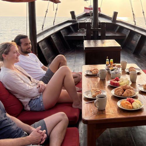 Private Angthong Marine Park Sailing Charter – breakfast on deck at sunrise on the way to the marine park – TourInKohSamui.com