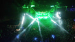 Utopia Party Koh Phangan – wide night view of the psychedelic jungle stage with green lasers over the crowd