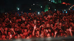 Utopia Party Koh Phangan – packed dance floor bathed in red light at the night party